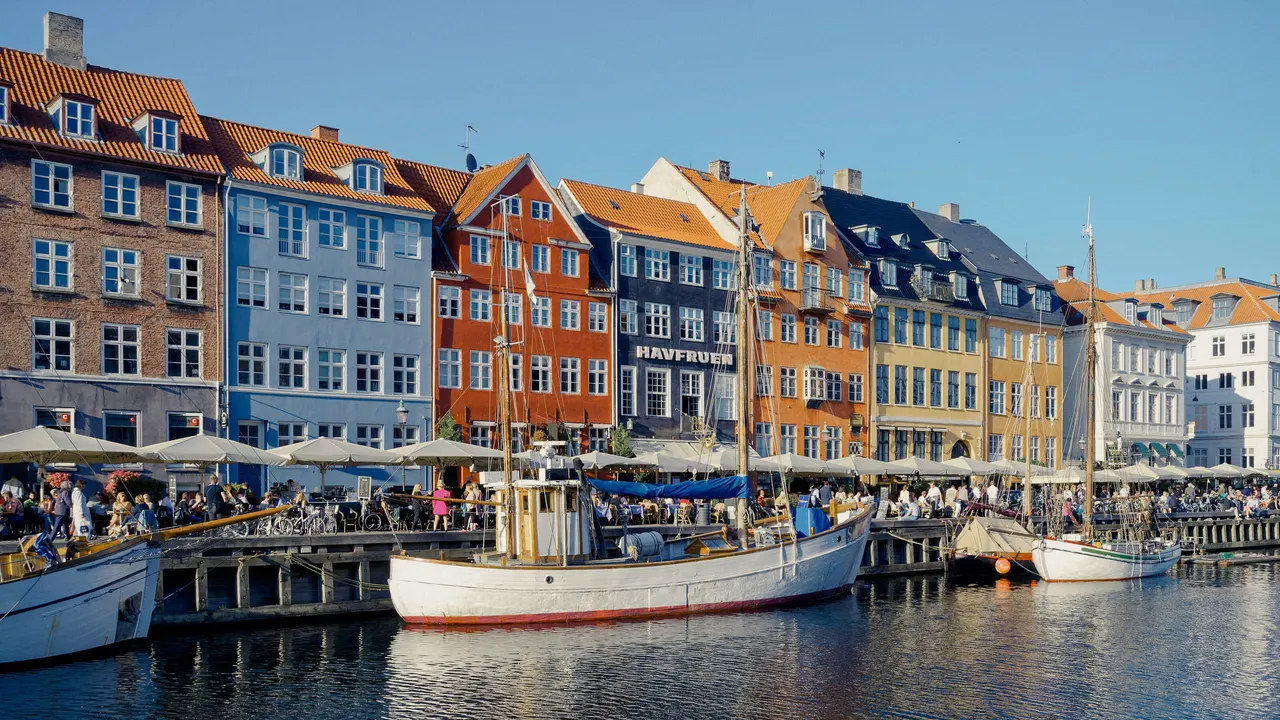 Colorful facades and boats along Nyhavn, Copenhagen