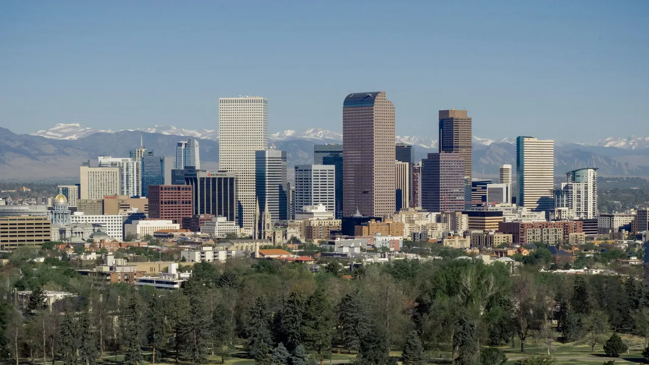 Downtown skyline below the Rocky Mountains, Denver