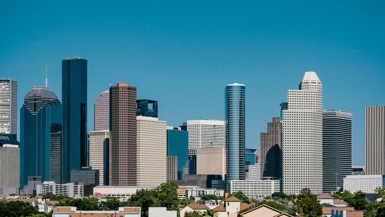 Downtown Houston skyline under a clear blue sky