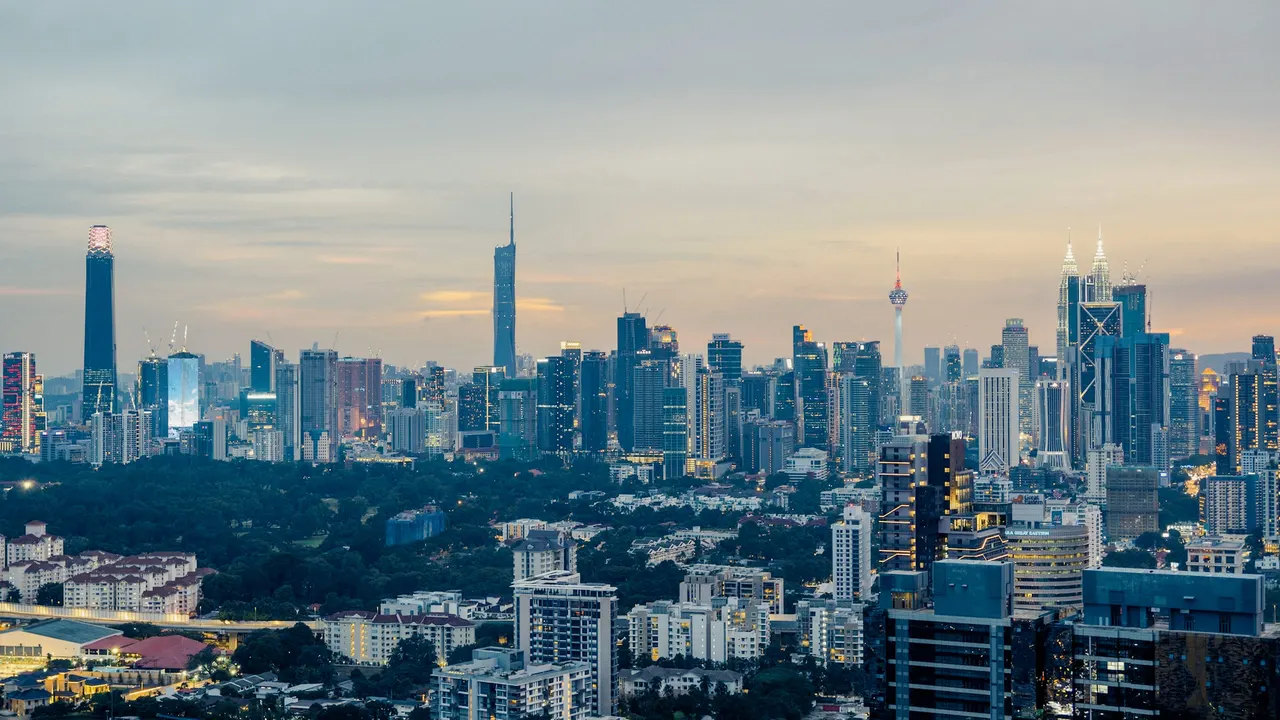 Petronas Towers and KL Tower at sunset, Kuala Lumpur