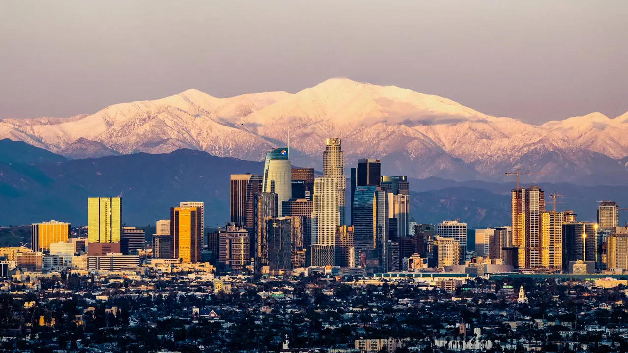 Downtown Los Angeles below the snow-capped San Gabriel Mountains