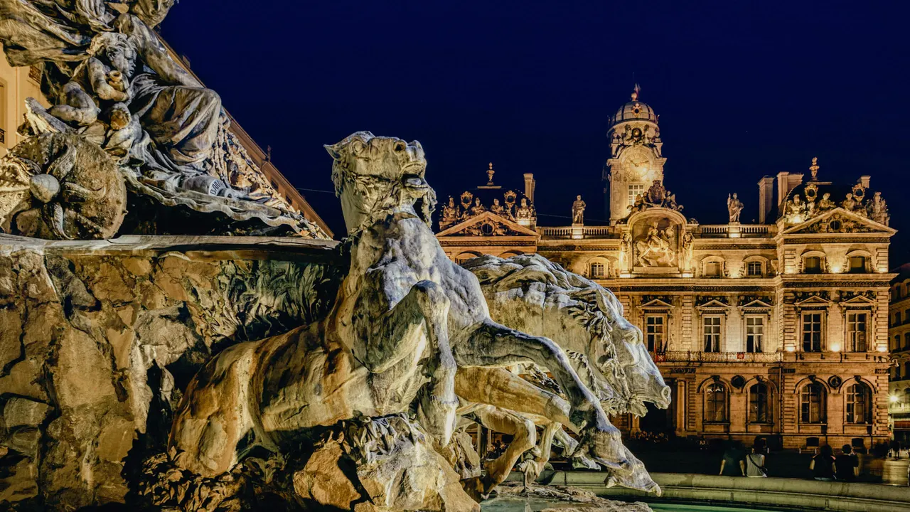 The Bartholdi Fountain and Hotel de Ville at night, Lyon